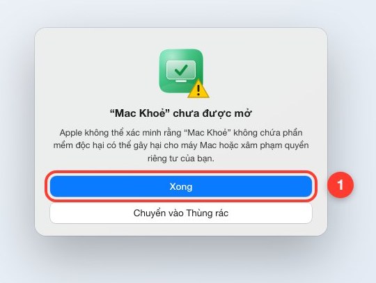 Bước 1: hộp thoại macOS báo “Mac Khoẻ” chưa được mở, bấm Xong